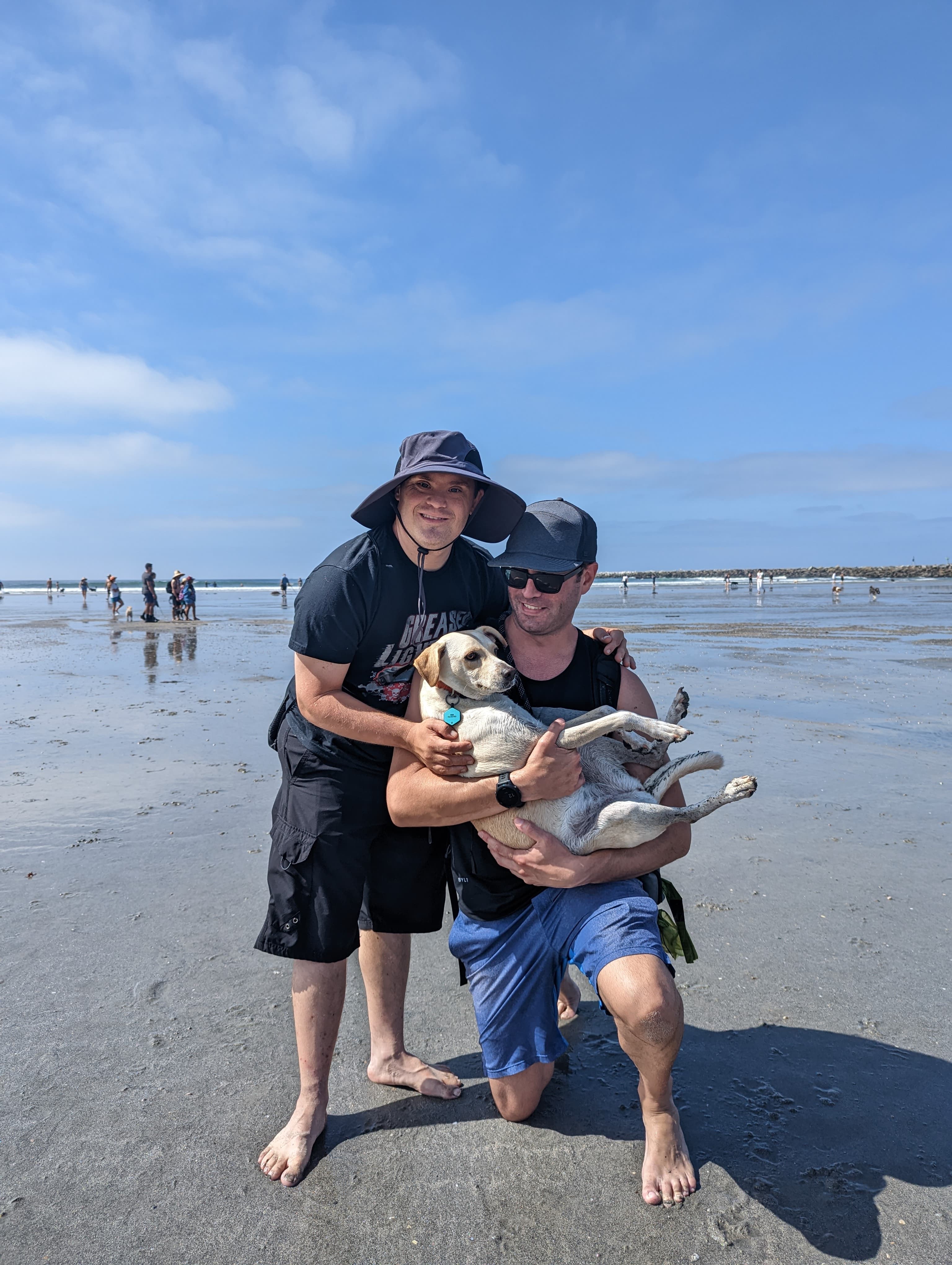 A man and his dog on the beach